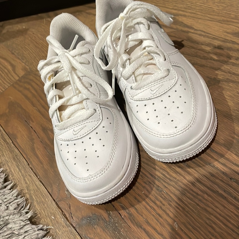 All white Nike Air Force ones